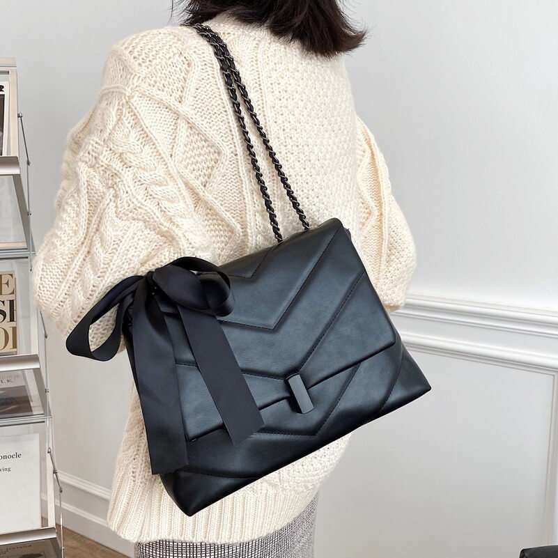 EvaBelle Flap Bag